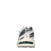 Sneakers in ecopelle e tessuto 
