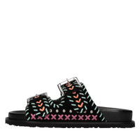 Mules in camoscio e pelle con borchie 
