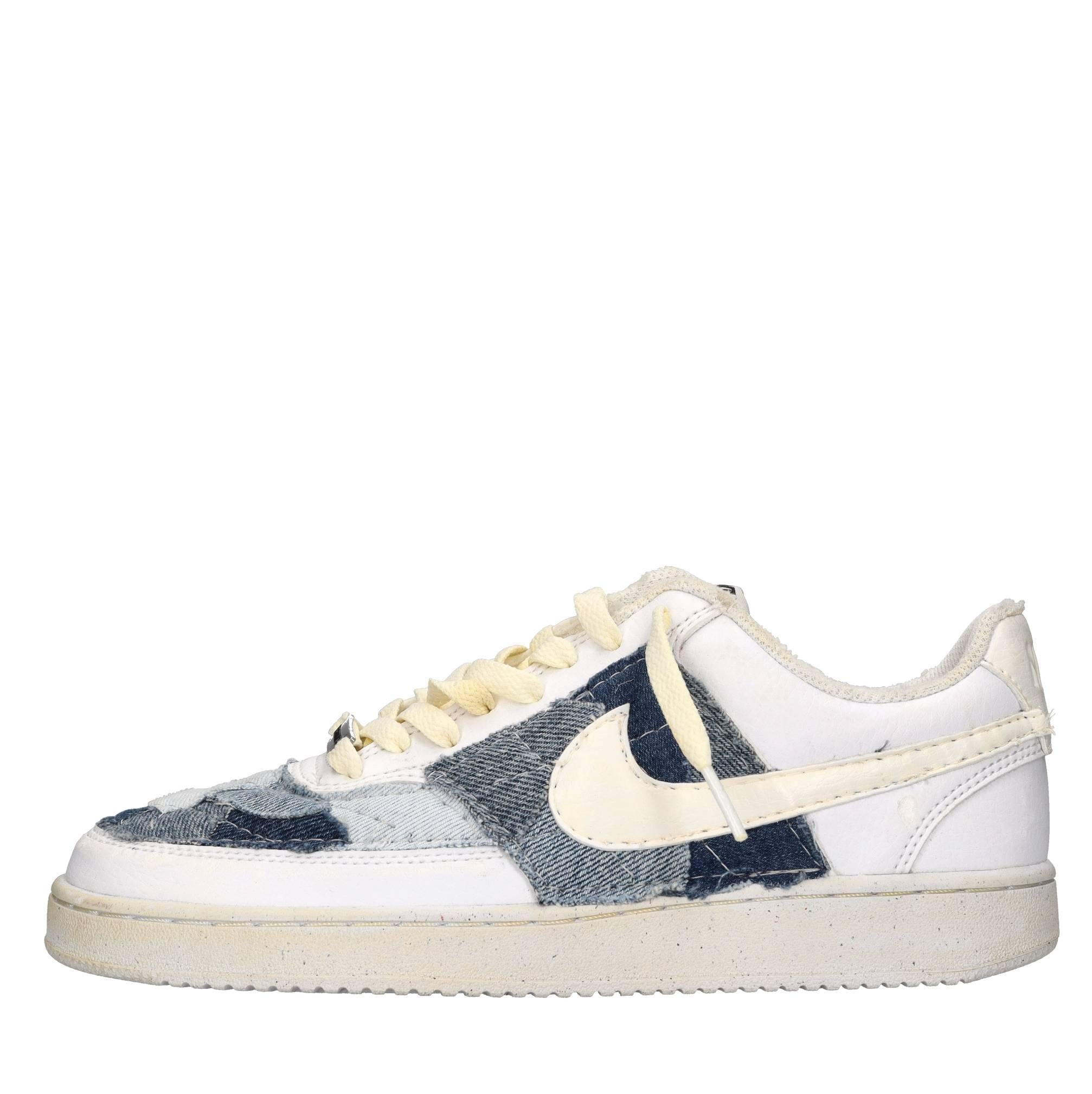 Sneakers in ecopelle e tessuto 