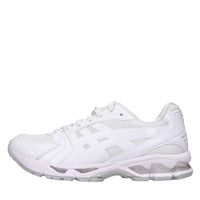 Sneakers in ecopelle e tessuto 