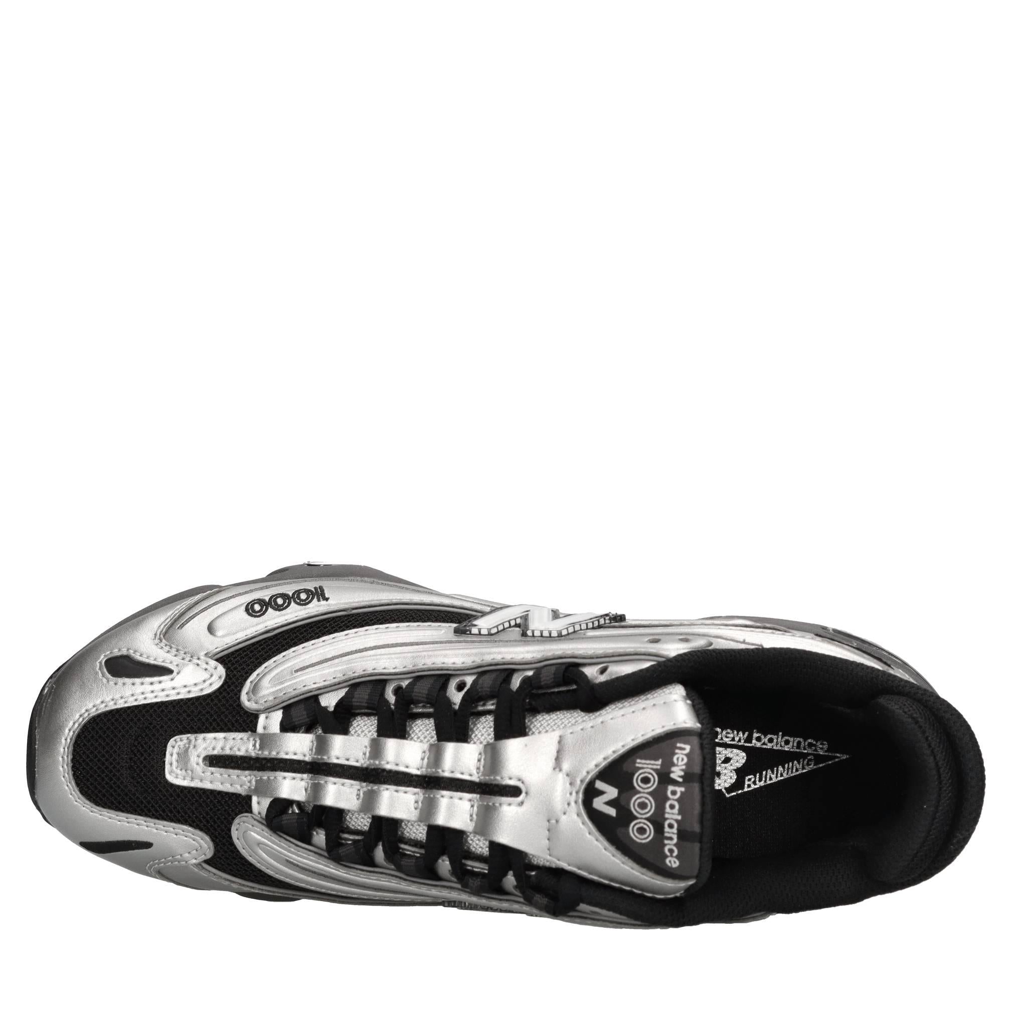 Sneakers in ecopelle e tessuto 