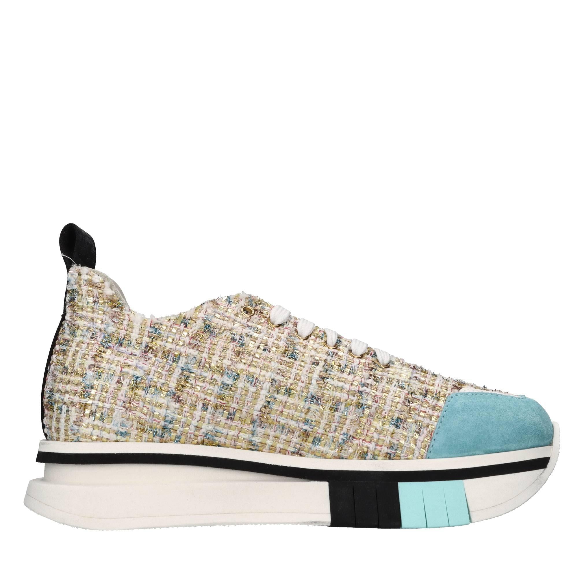 Sneakers in tessuto con inserti in camoscio 
