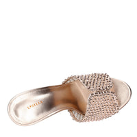 Mules in pelle tessuto e PVC 
