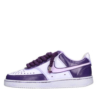 Sneakers in ecopelle e tessuto 