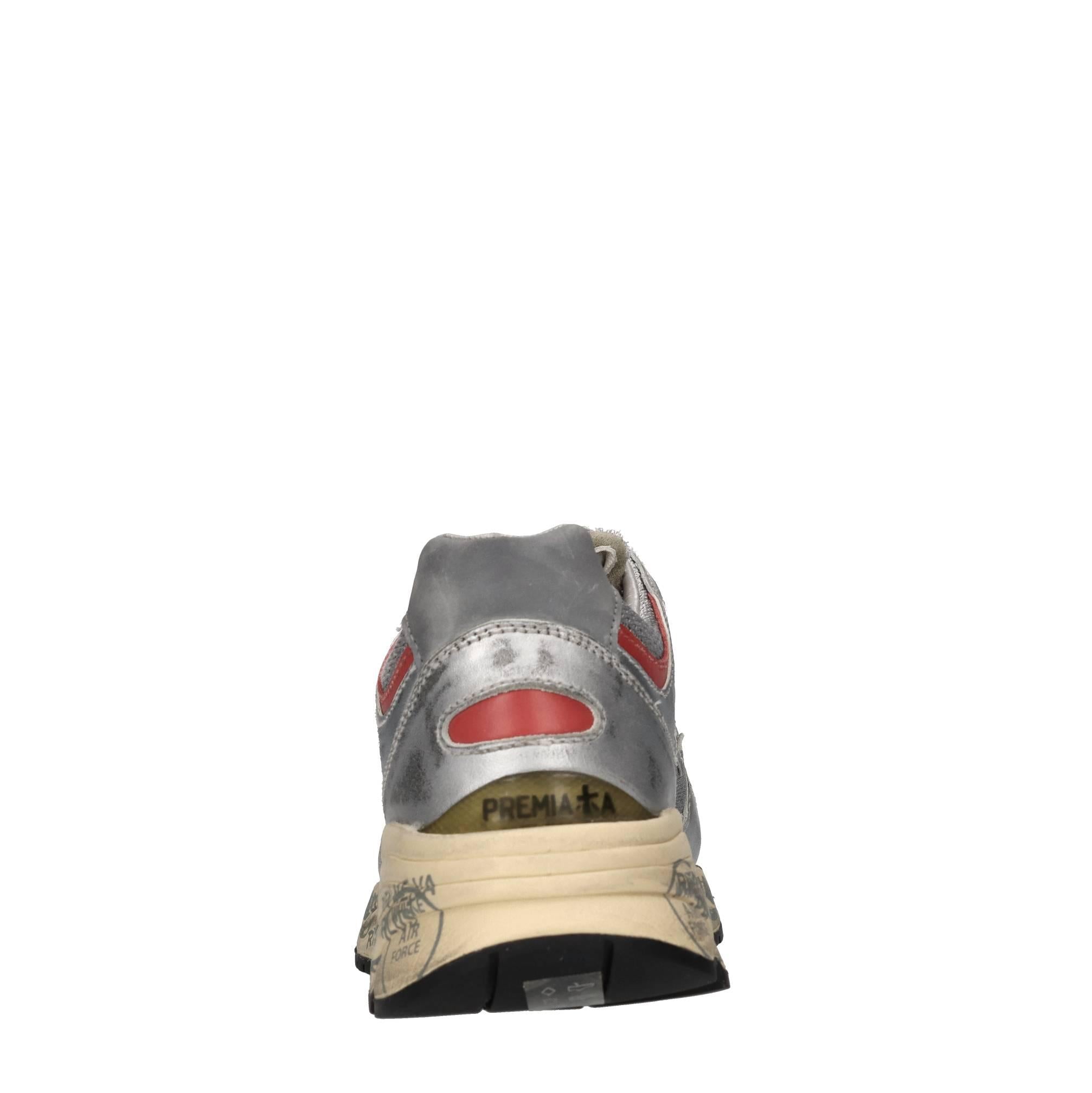 Sneakers in pelle, ecopelle e tessuto 