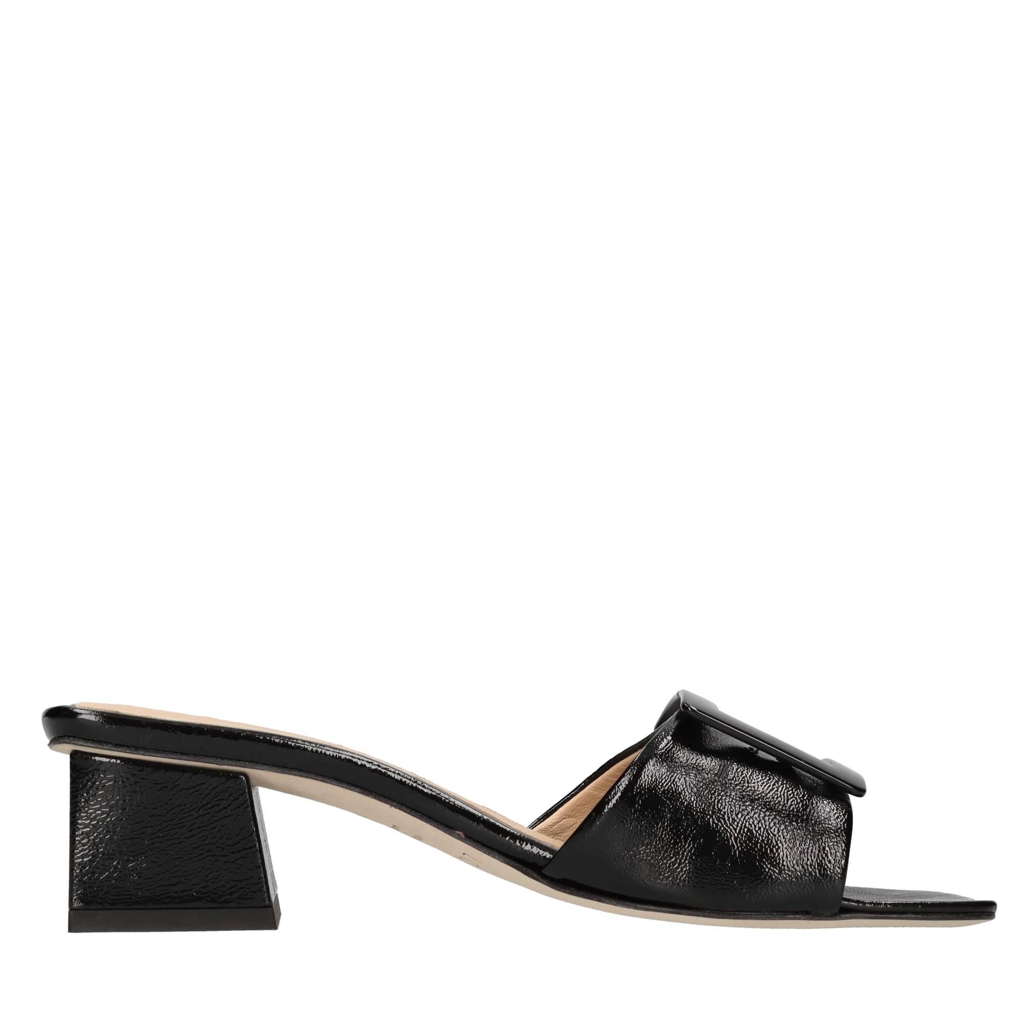 Mules in pelle e vernice 