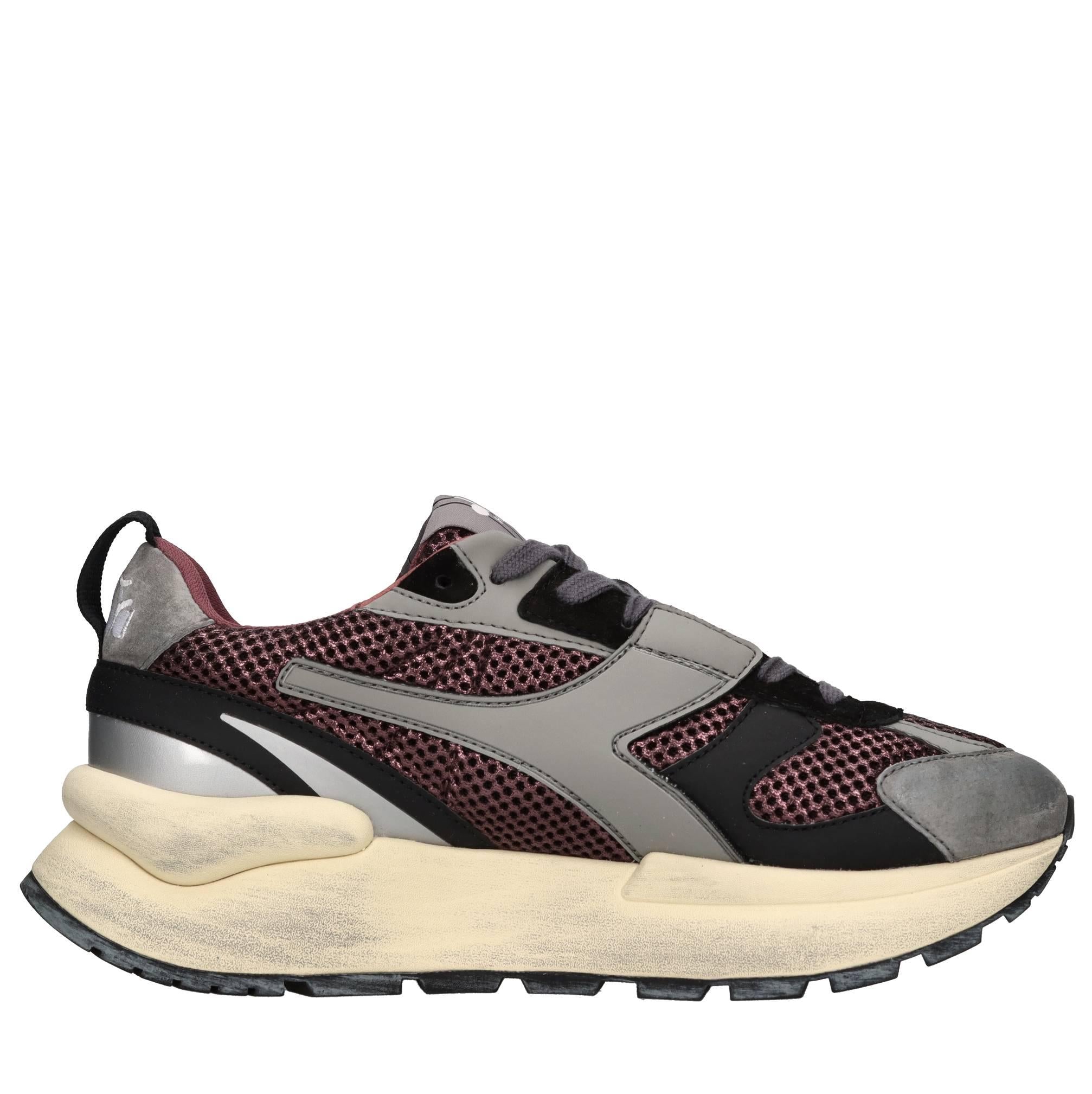 Sneakers in pelle e tessuto 