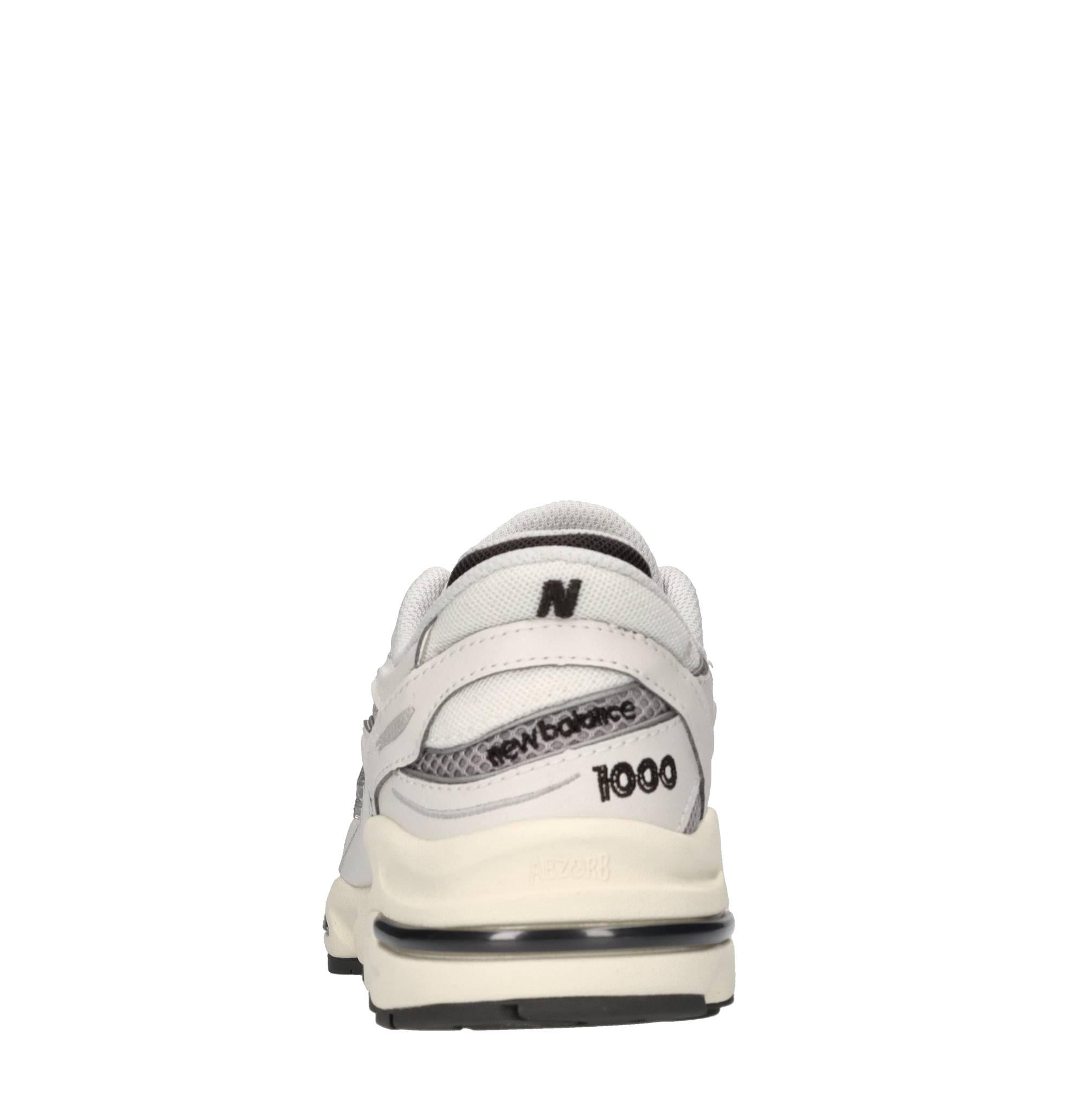 Sneakers in ecopelle e tessuto 