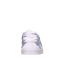 Sneakers in pelle e tessuto 