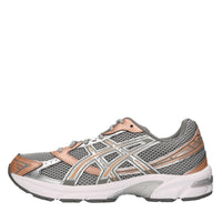 Sneakers in ecopelle e tessuto 