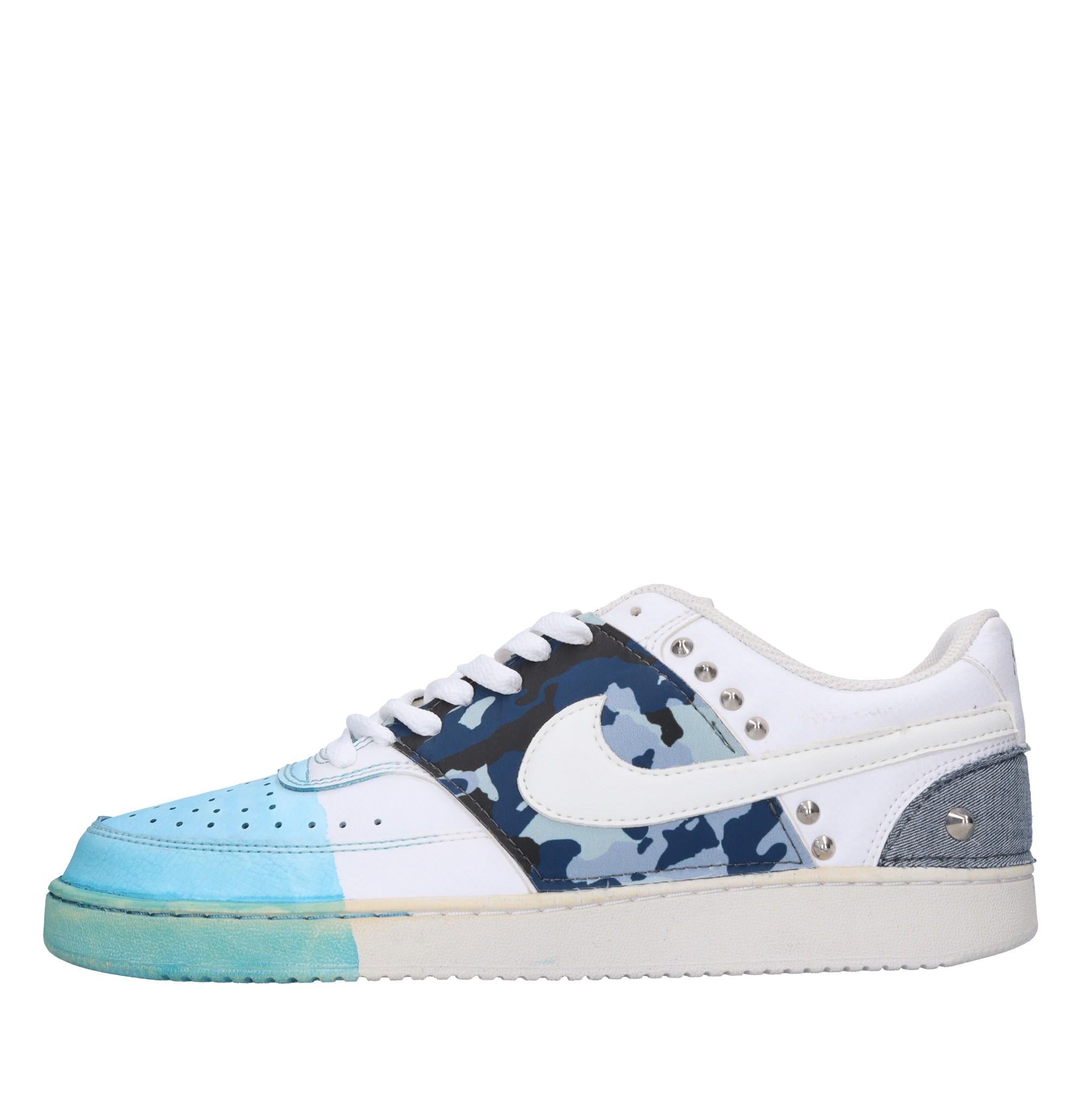 Sneakers in ecopelle e tessuto 