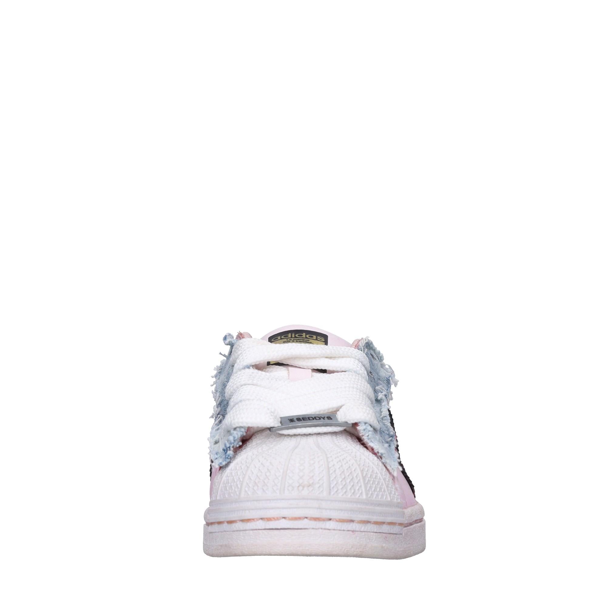 Sneakers in pelle e tessuto 