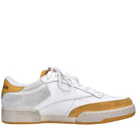 Sneakers in pelle camoscio e tessuto 