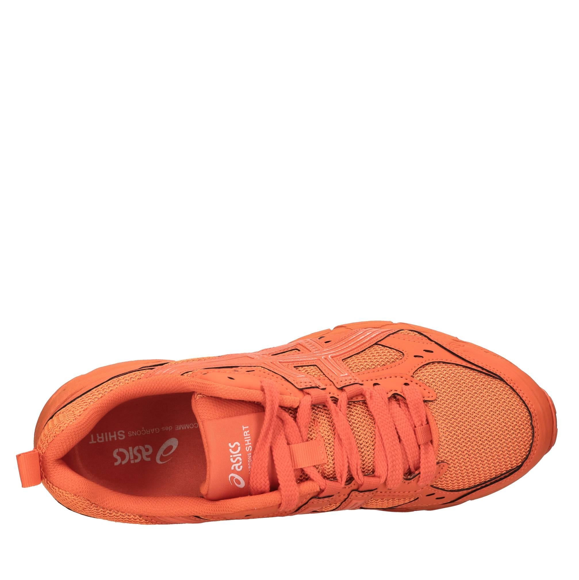 Sneakers in ecopelle e tessuto 