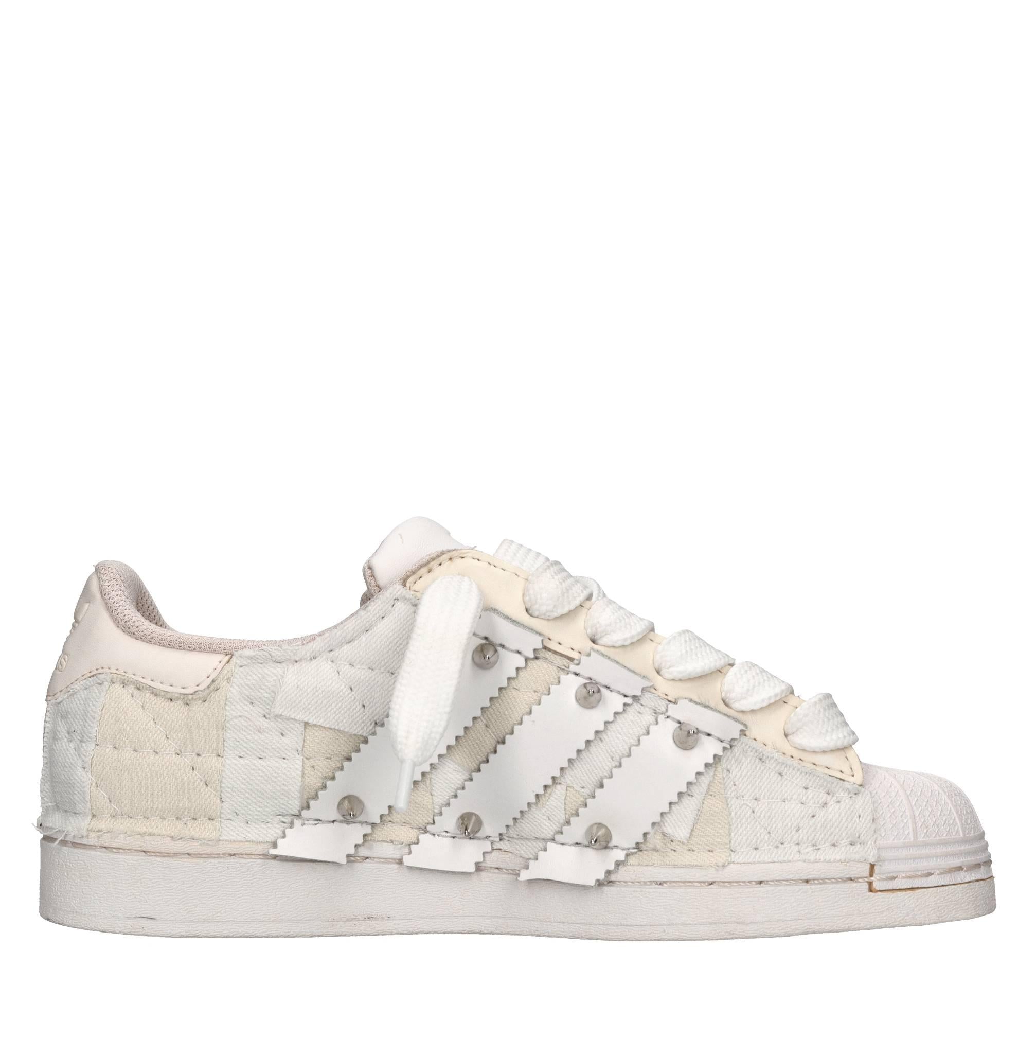 Sneakers in ecopelle e tessuto 