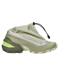 Sneakers in tessuto tecnico ed altre materie 