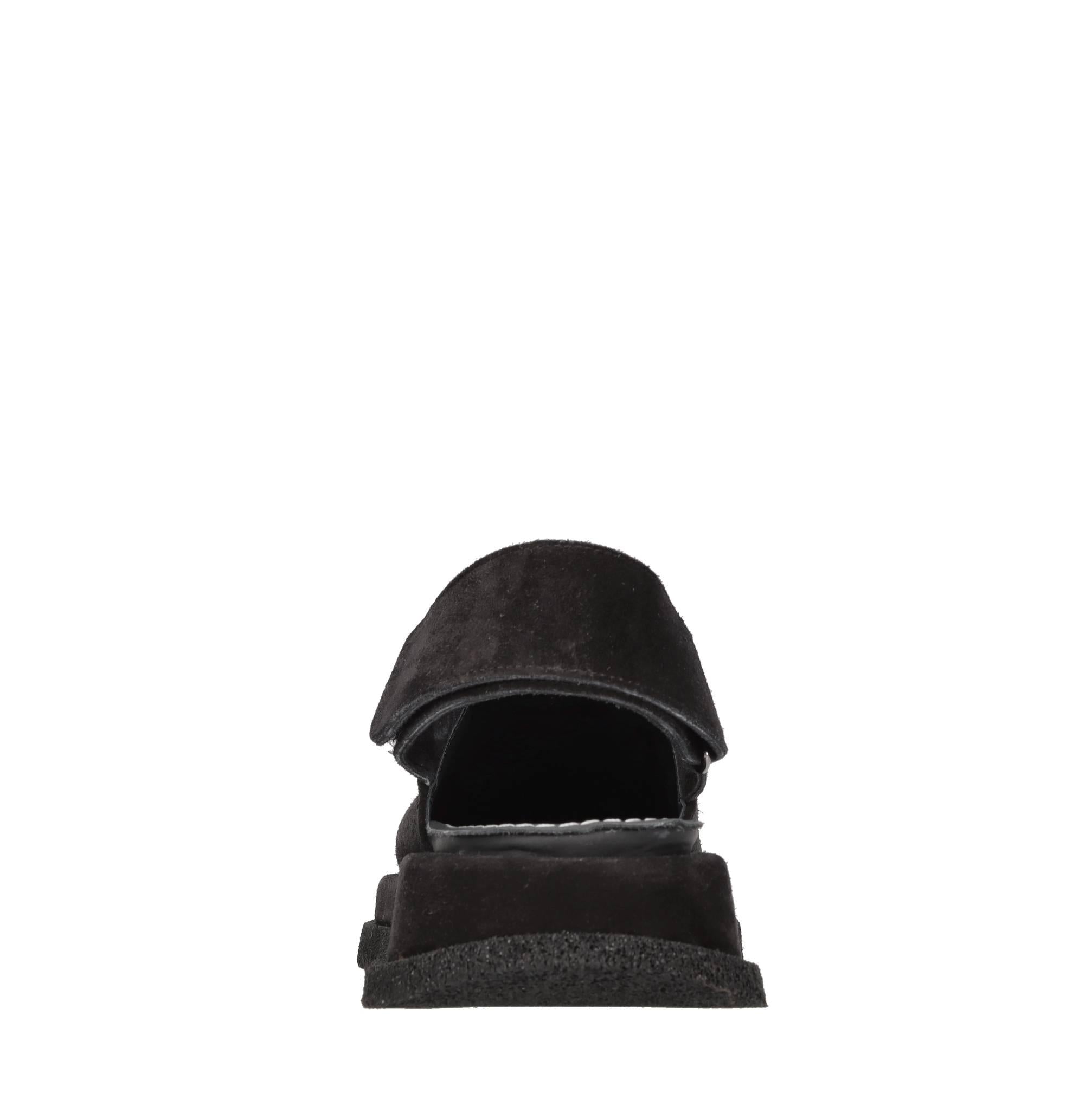 Mules in camoscio e pelle 