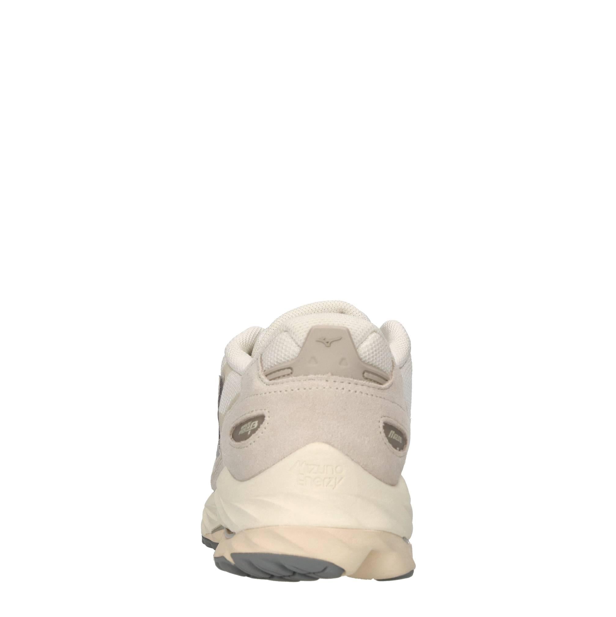 Sneakers in pelle e tessuto 