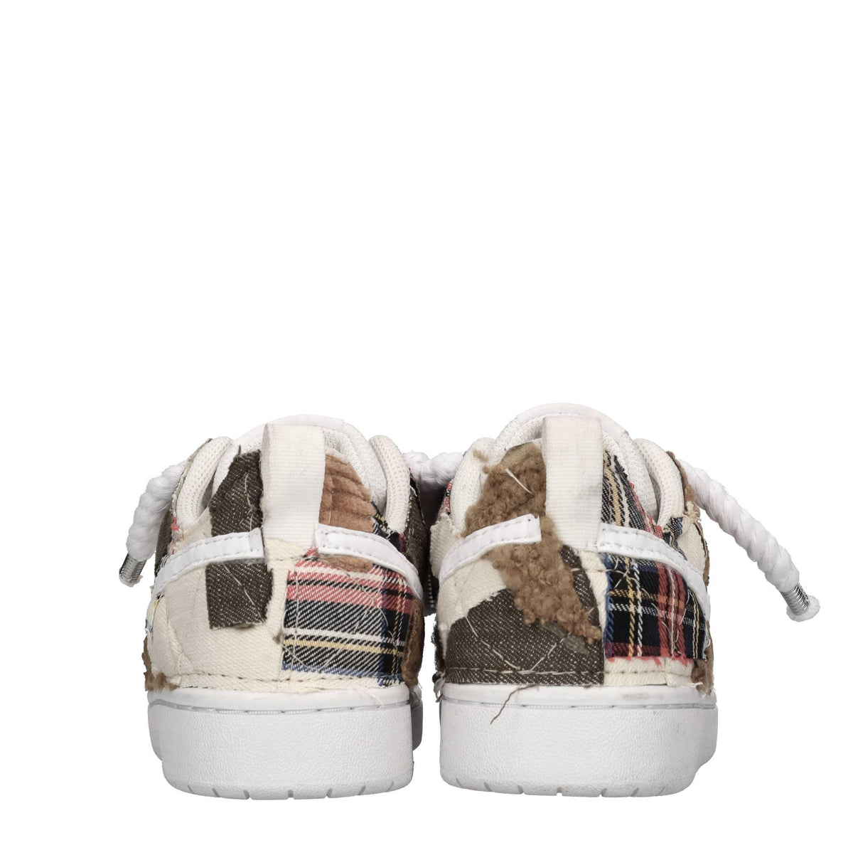 Sneakers in ecopelle e tessuto 