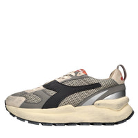 Sneakers in pelle e tessuto 