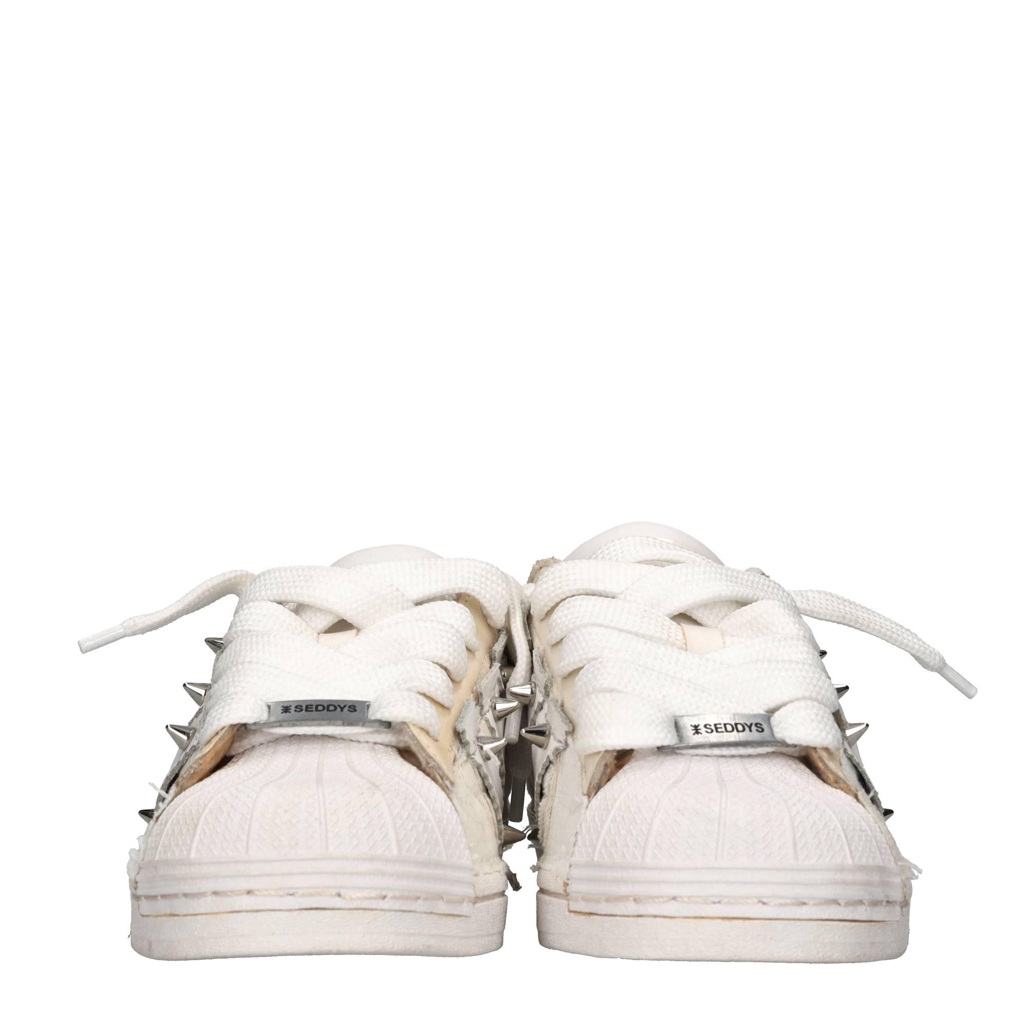 Sneakers in ecopelle e tessuto 