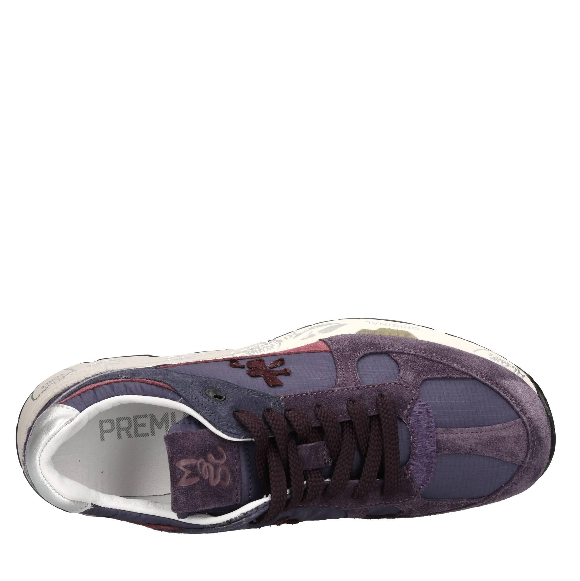 Sneakers in pelle e tessuto 
