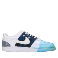 Sneakers in ecopelle e tessuto 