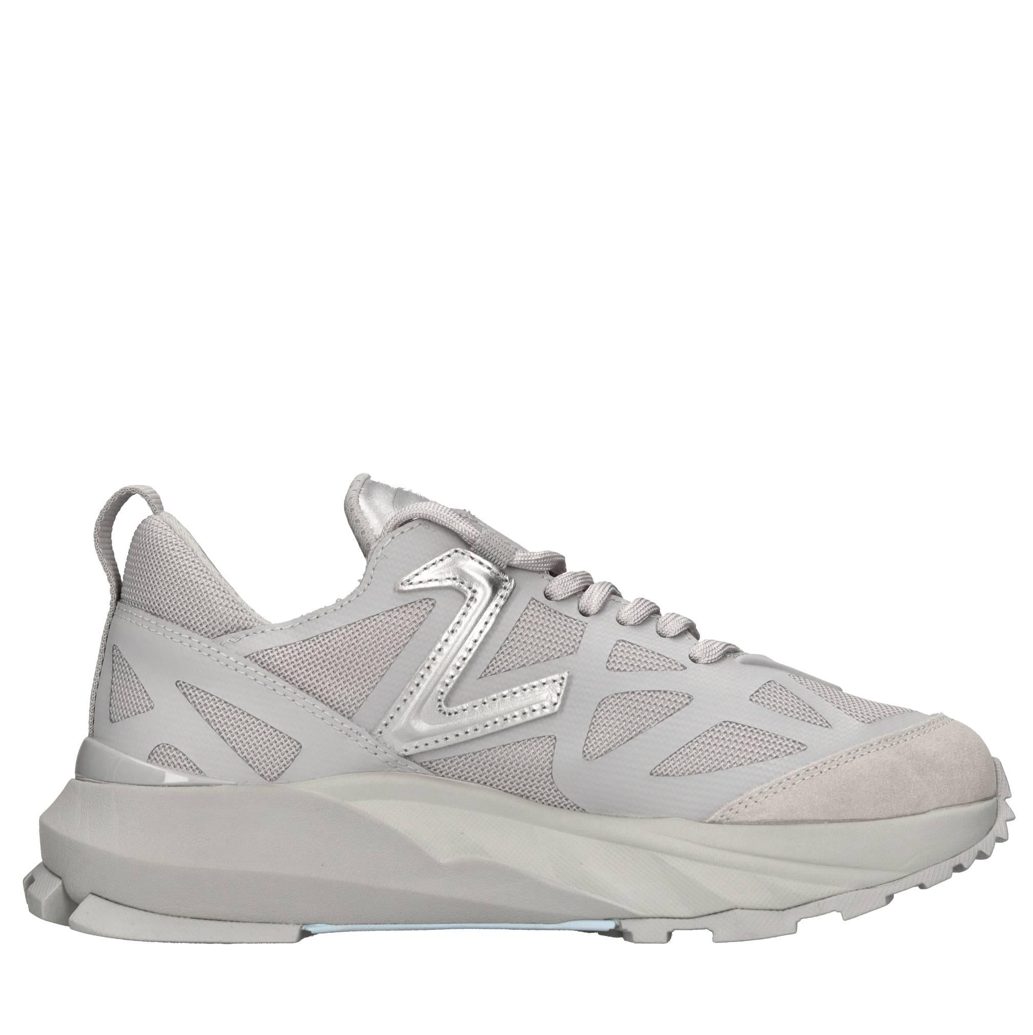 Sneakers in ecopelle e tessuto 