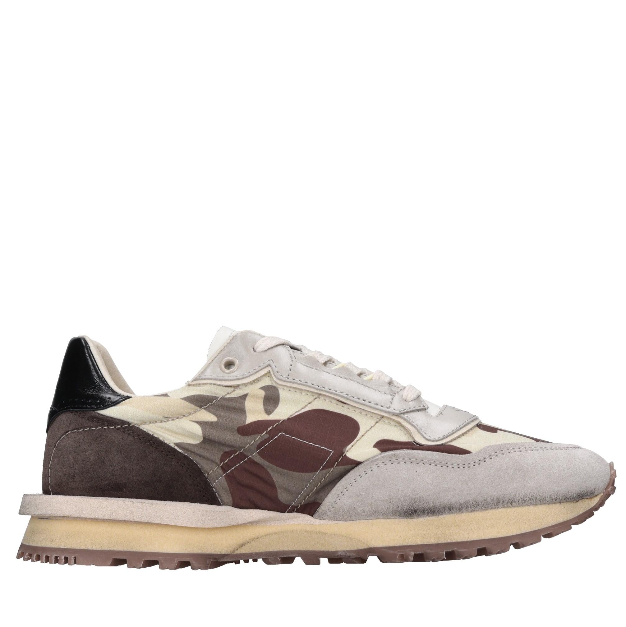 Sneakers in pelle e tessuto 