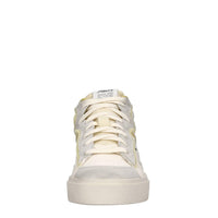 Sneakers in pelle e tessuto 