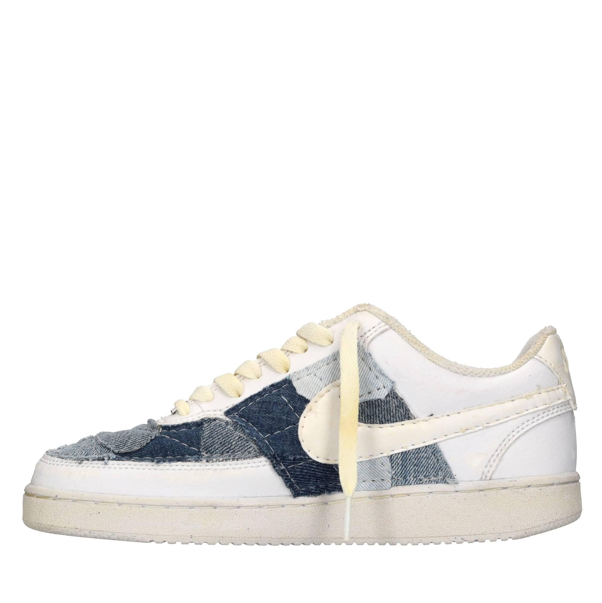 Sneakers in ecopelle e tessuto 