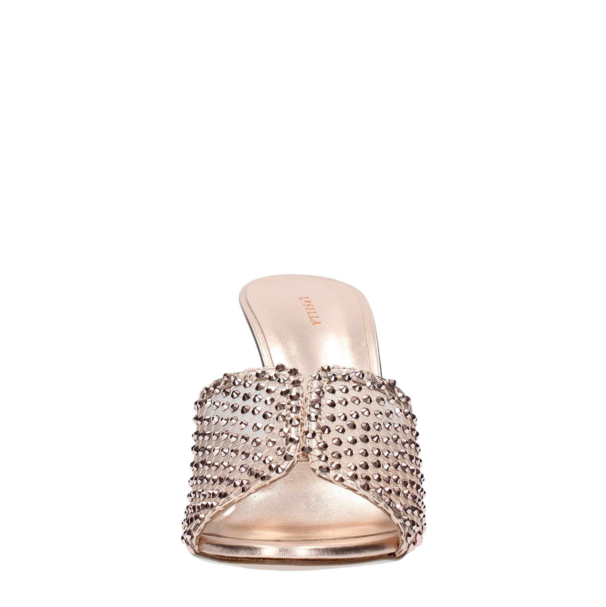 Mules in pelle tessuto e PVC 