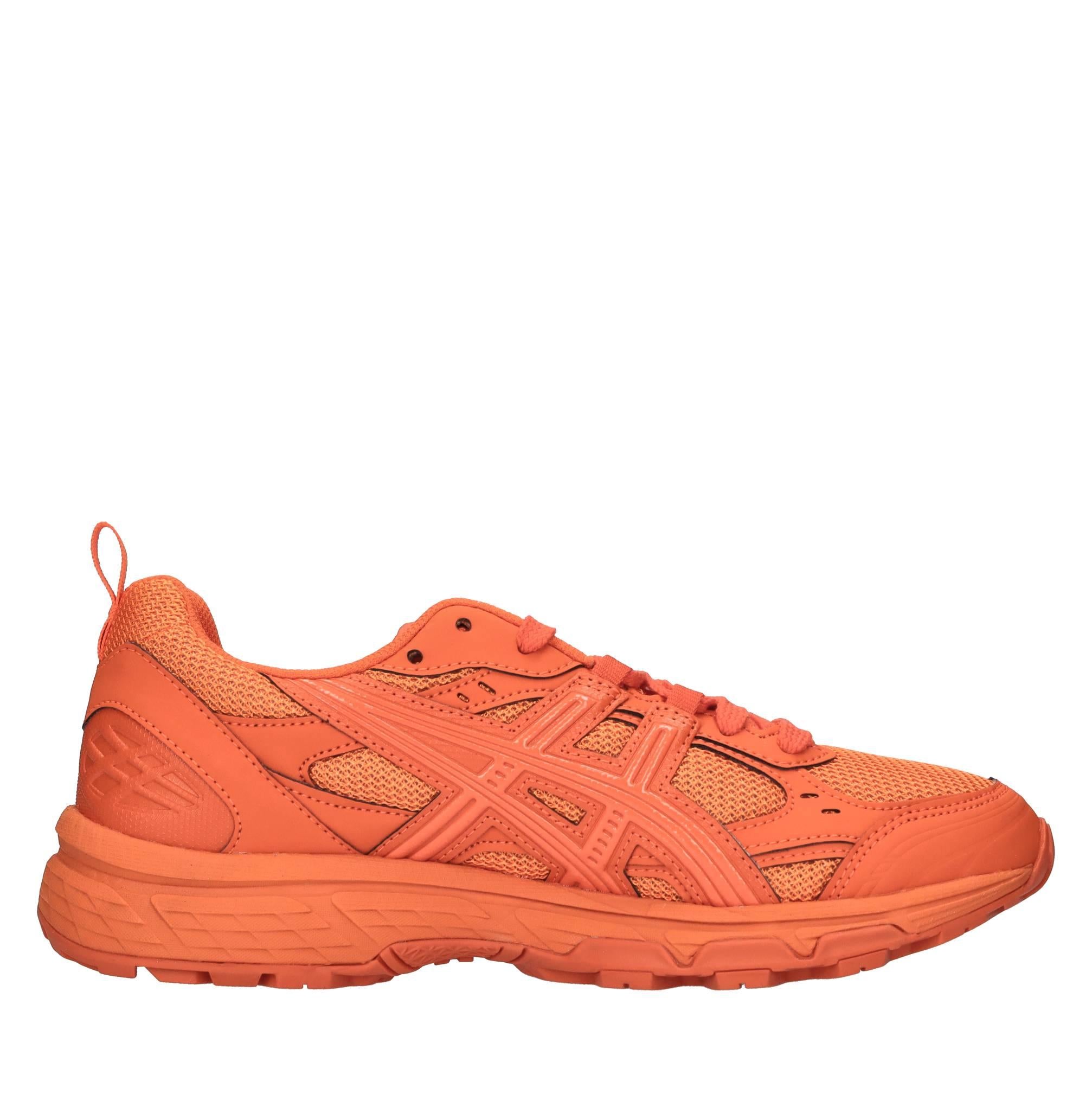 Sneakers in ecopelle e tessuto 