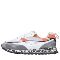 Sneakers in pelle e tessuto 