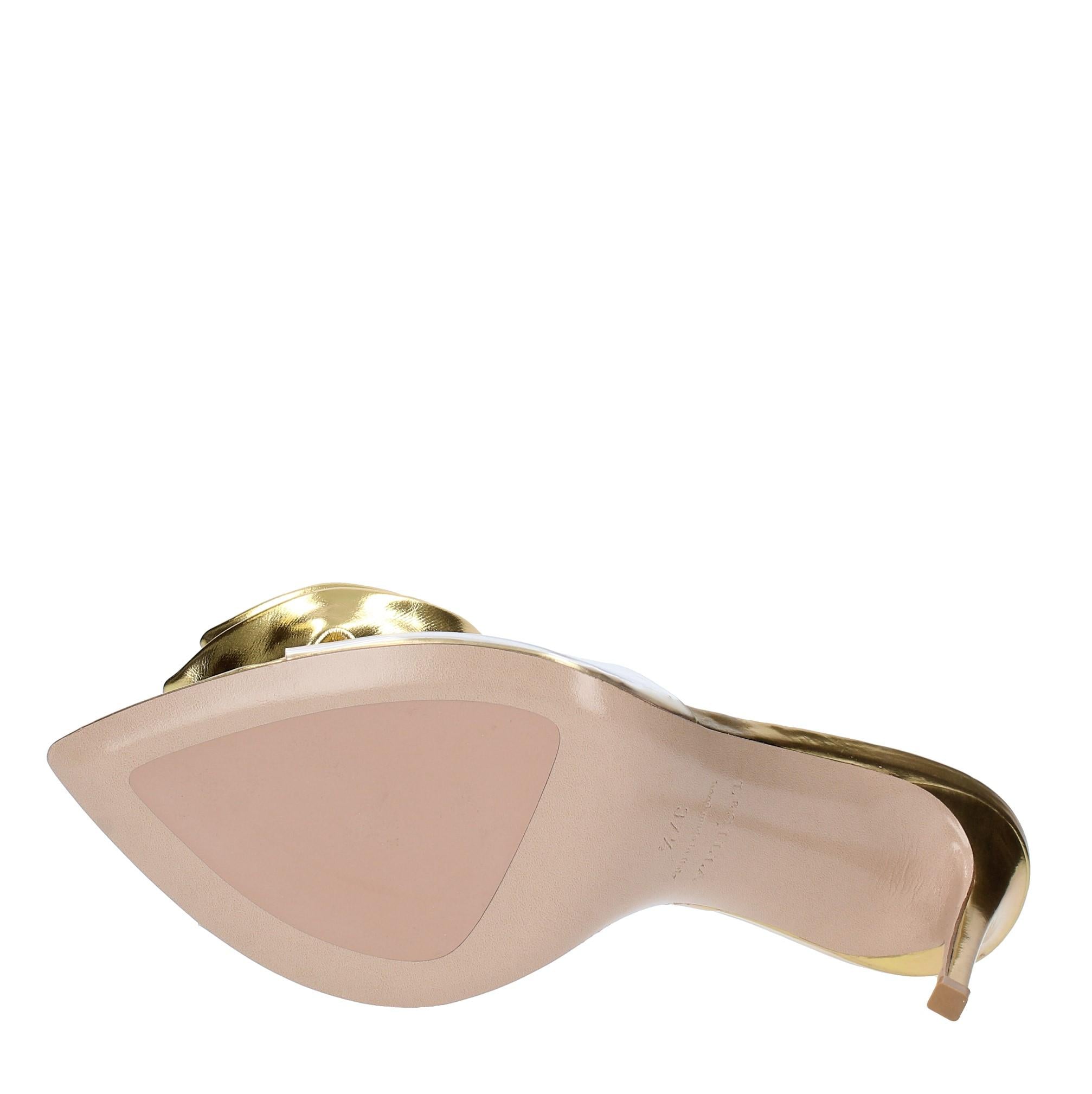 Mules in pelle e PVC 
