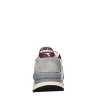 Sneakers in camoscio e tessuto 