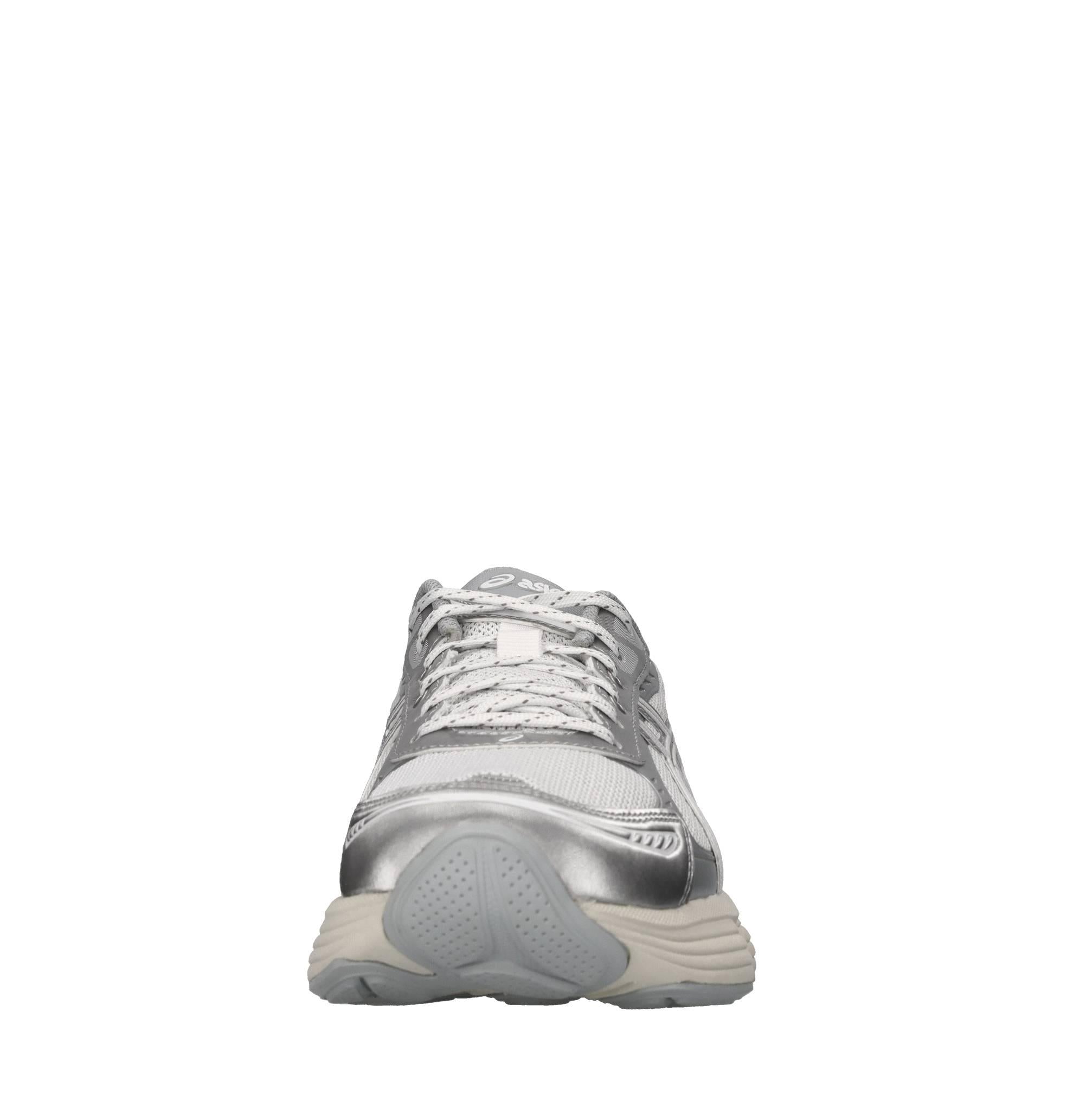 Sneakers in ecopelle e tessuto 