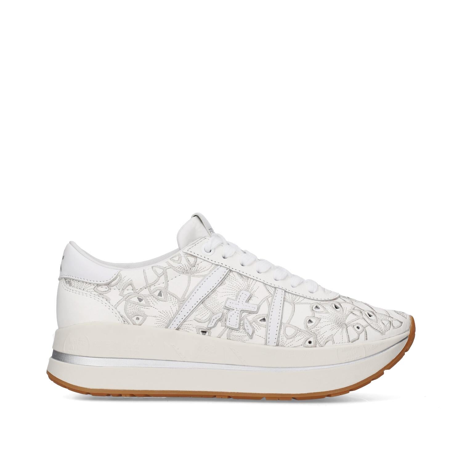 Sneakers in pelle e tessuto 