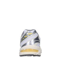 Sneakers in ecopelle e tessuto 