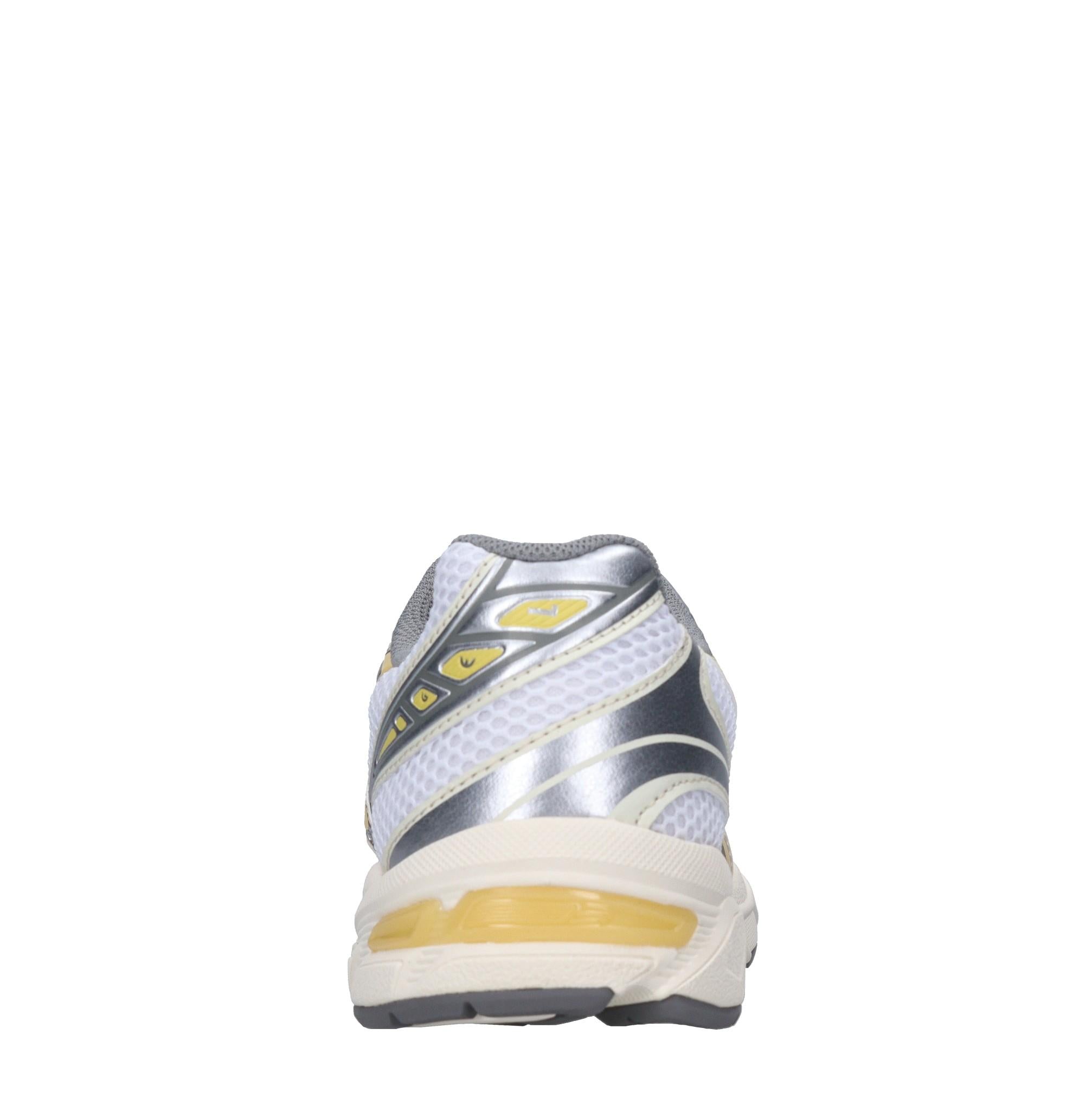 Sneakers in ecopelle e tessuto 