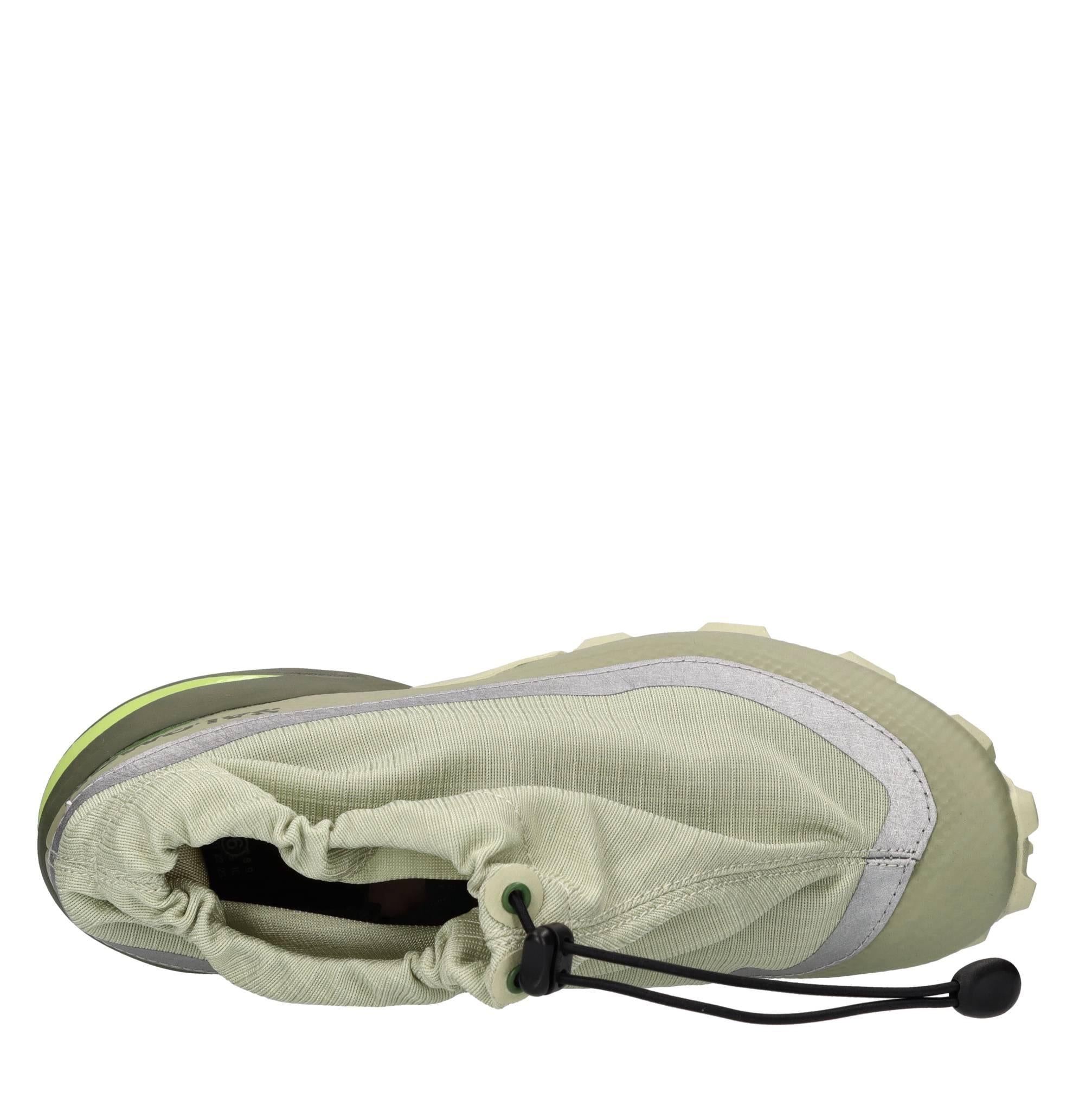 Sneakers in tessuto tecnico ed altre materie 