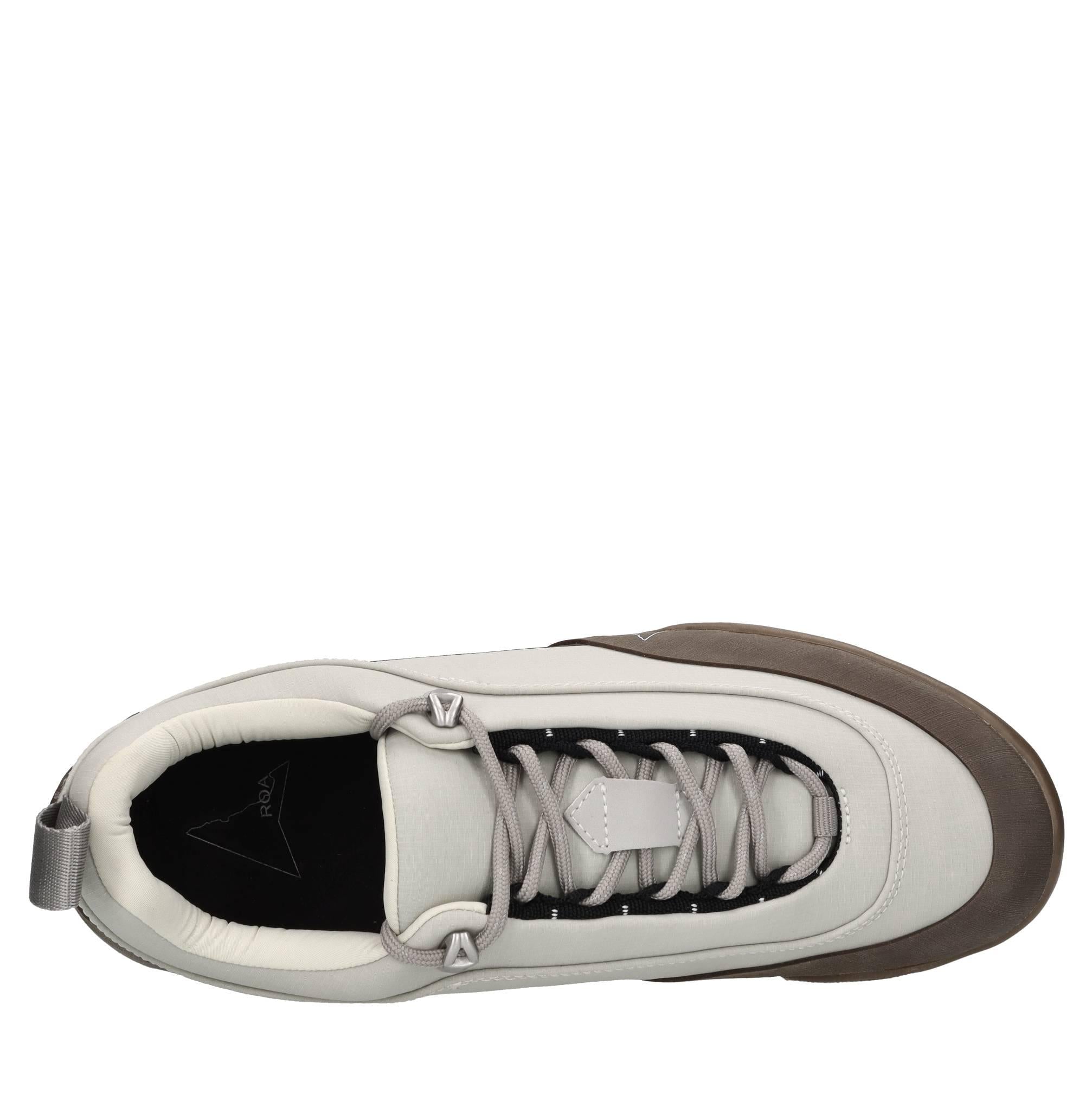 Sneakers in ecopelle e tessuto 