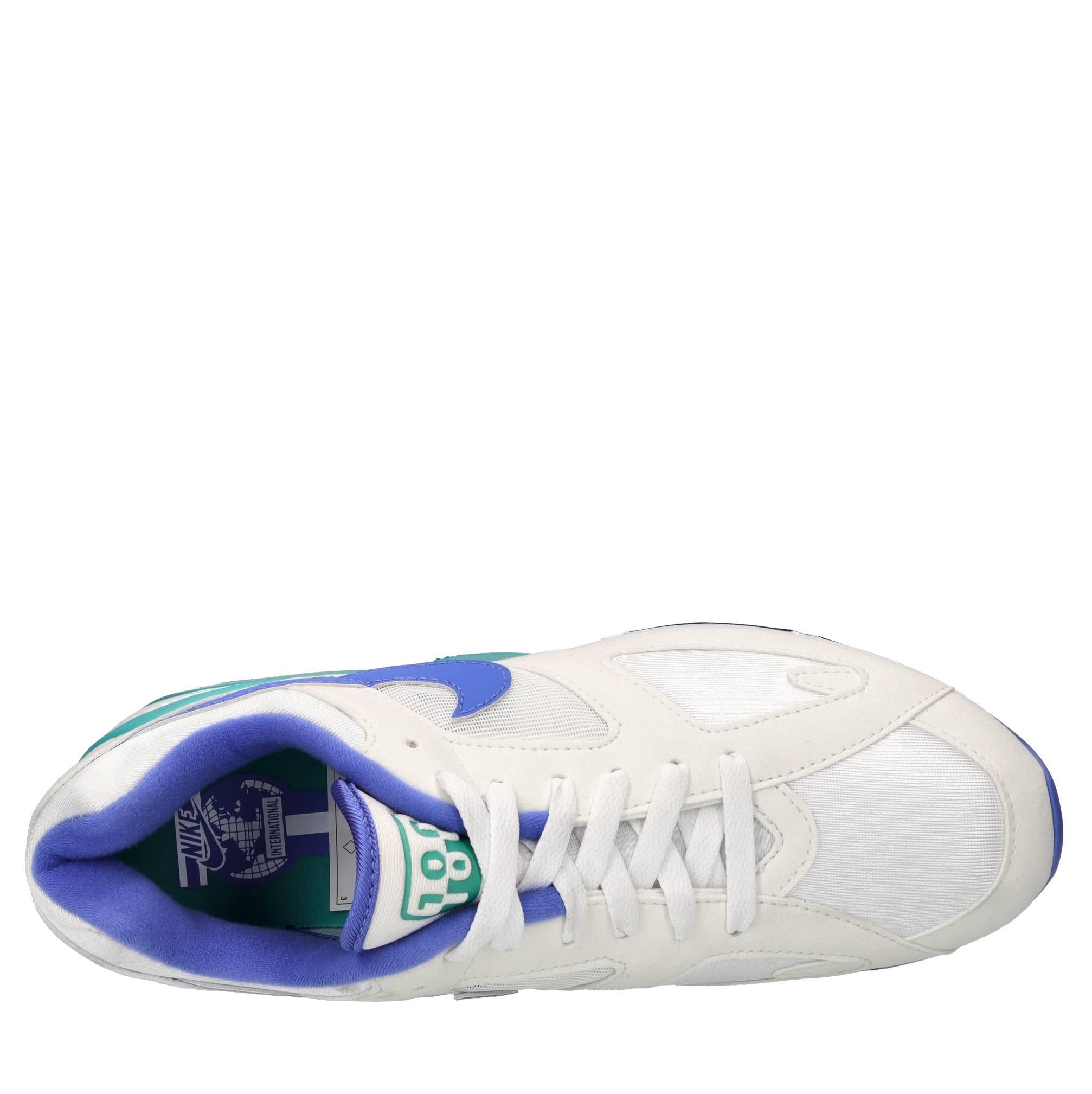 Sneakers in ecopelle e tessuto 