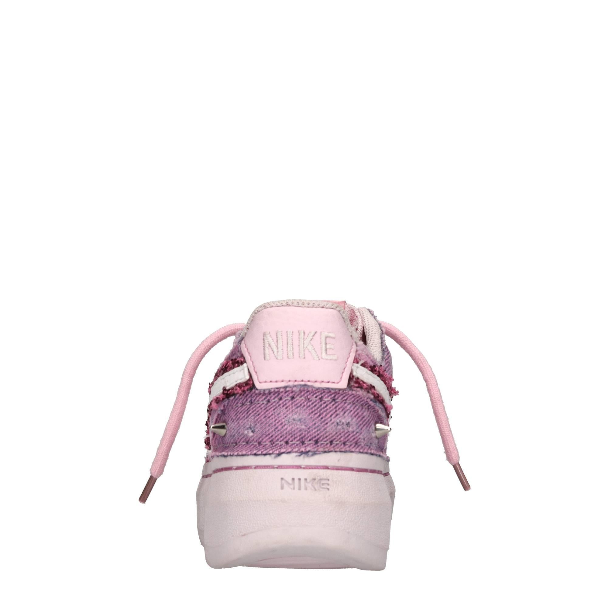 Sneakers in ecopelle e tessuto 