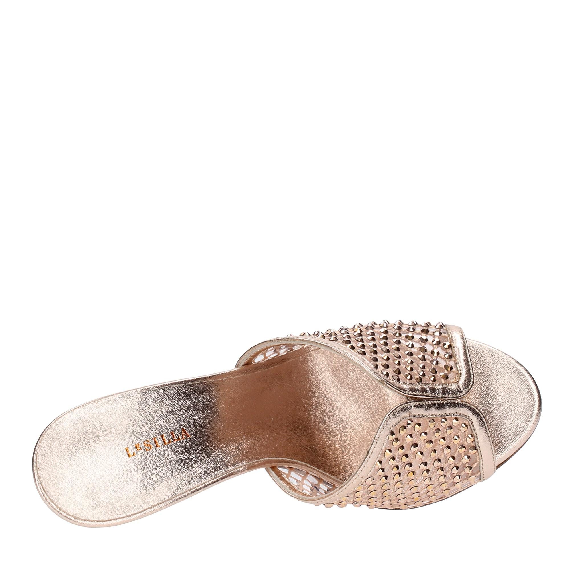 Mules in pelle tessuto e PVC 