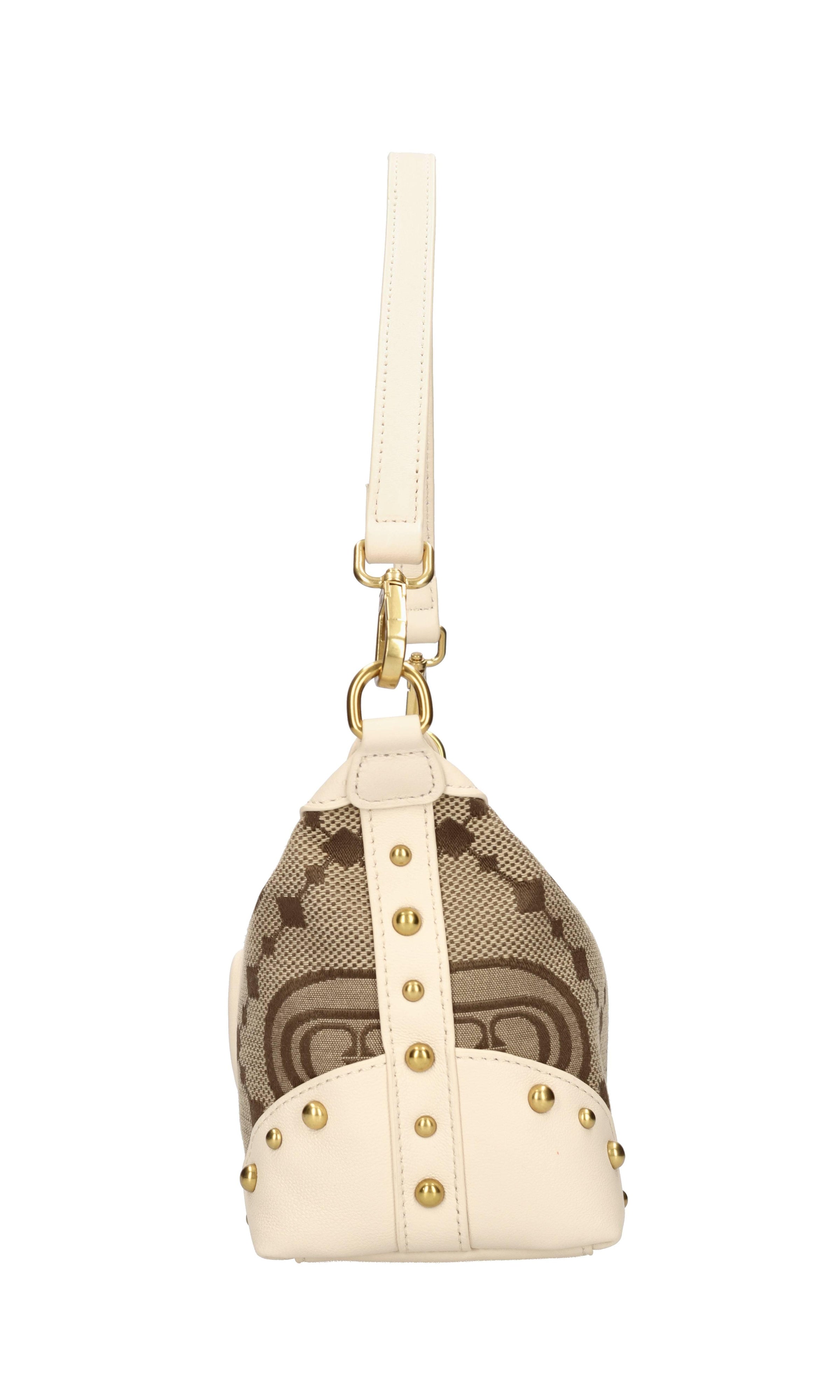 Borsa in tessuto con inserti in pelle e borchie 