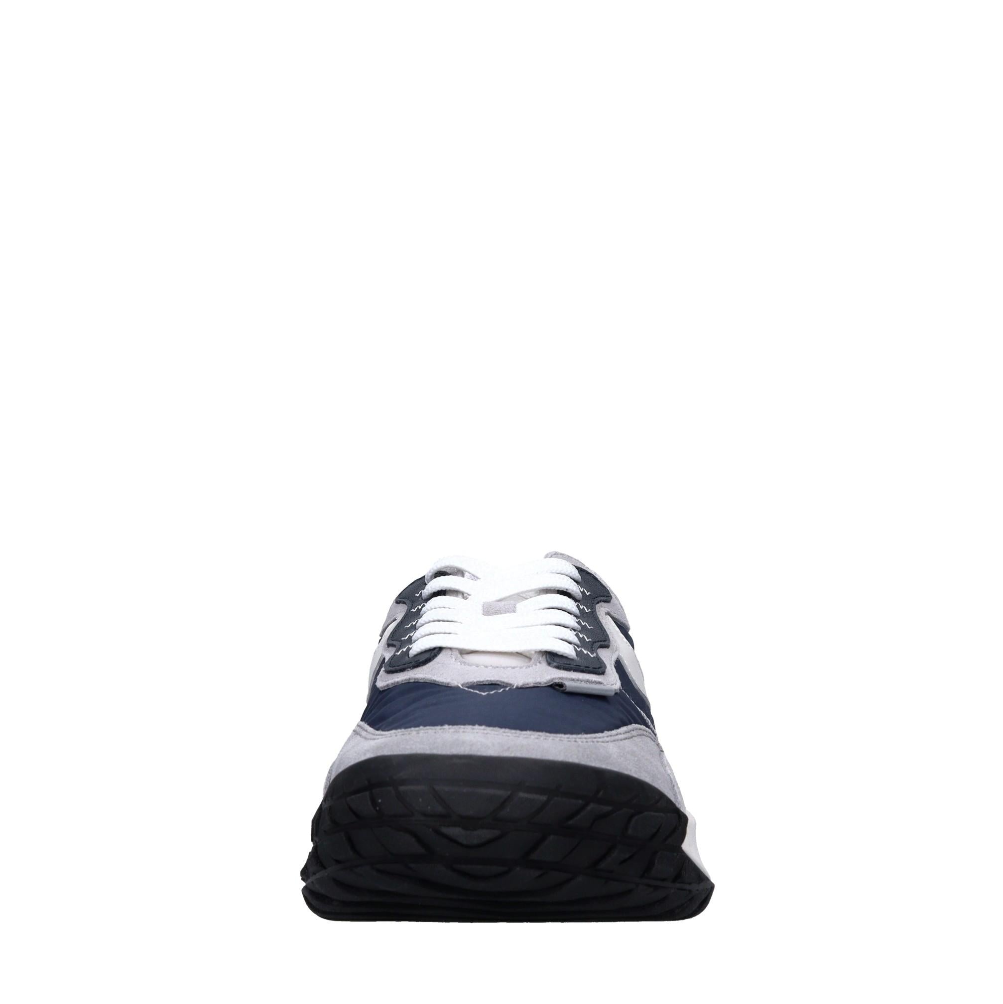 Sneakers in pelle e tessuto 
