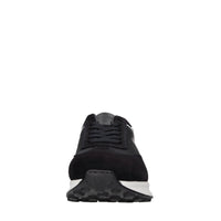 Sneakers in pelle e tessuto. 