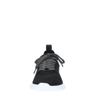 Sneakers in tessuto e pelle 