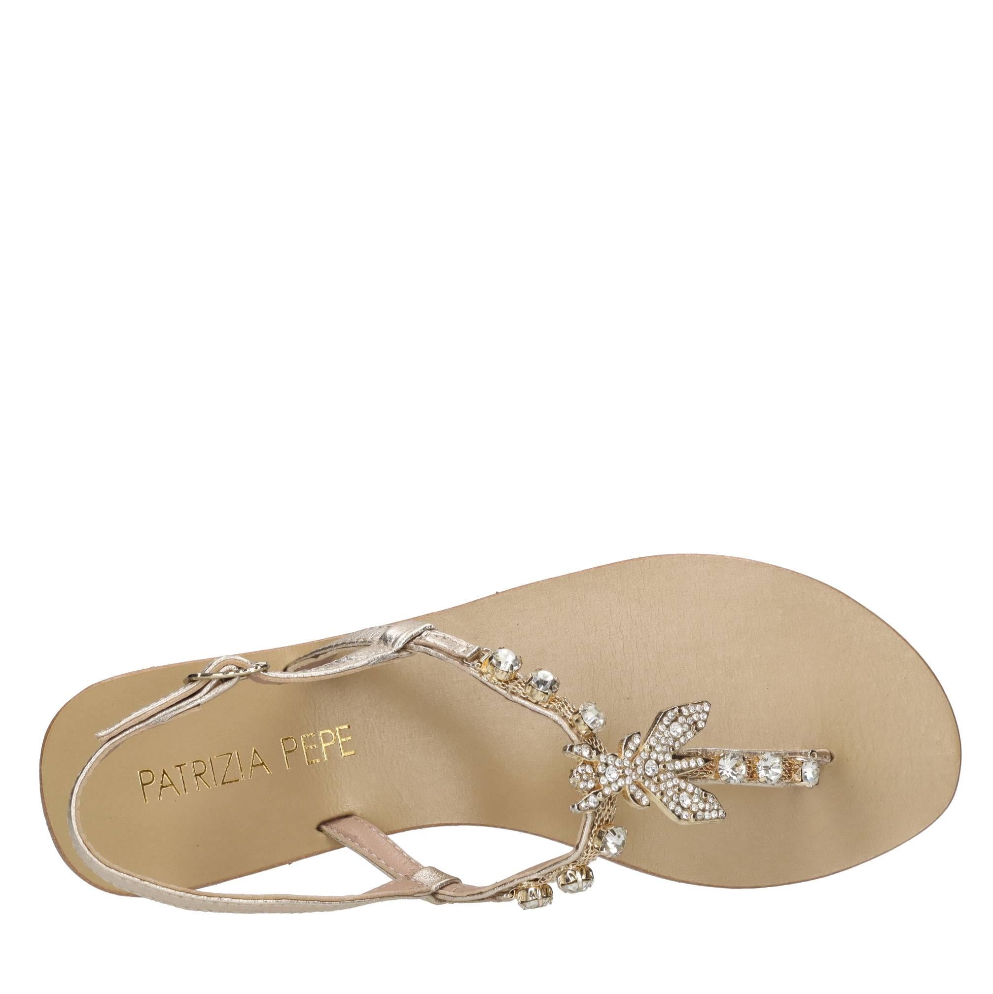 Sandali flat infradito in pelle con accessorio gioiello 